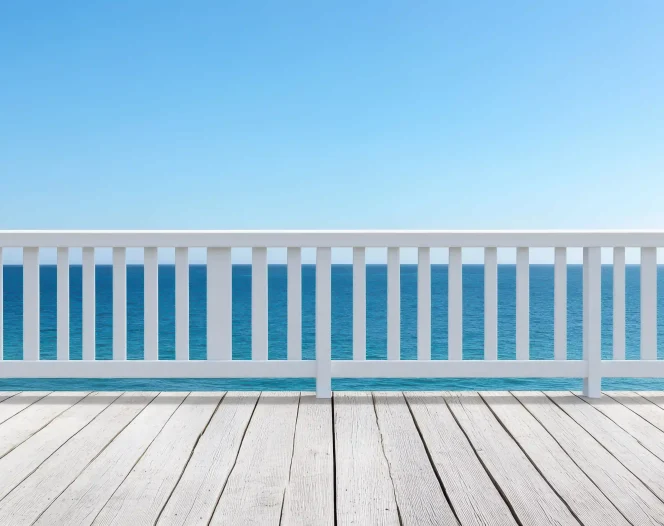 white wooden deck with ocean view free photo